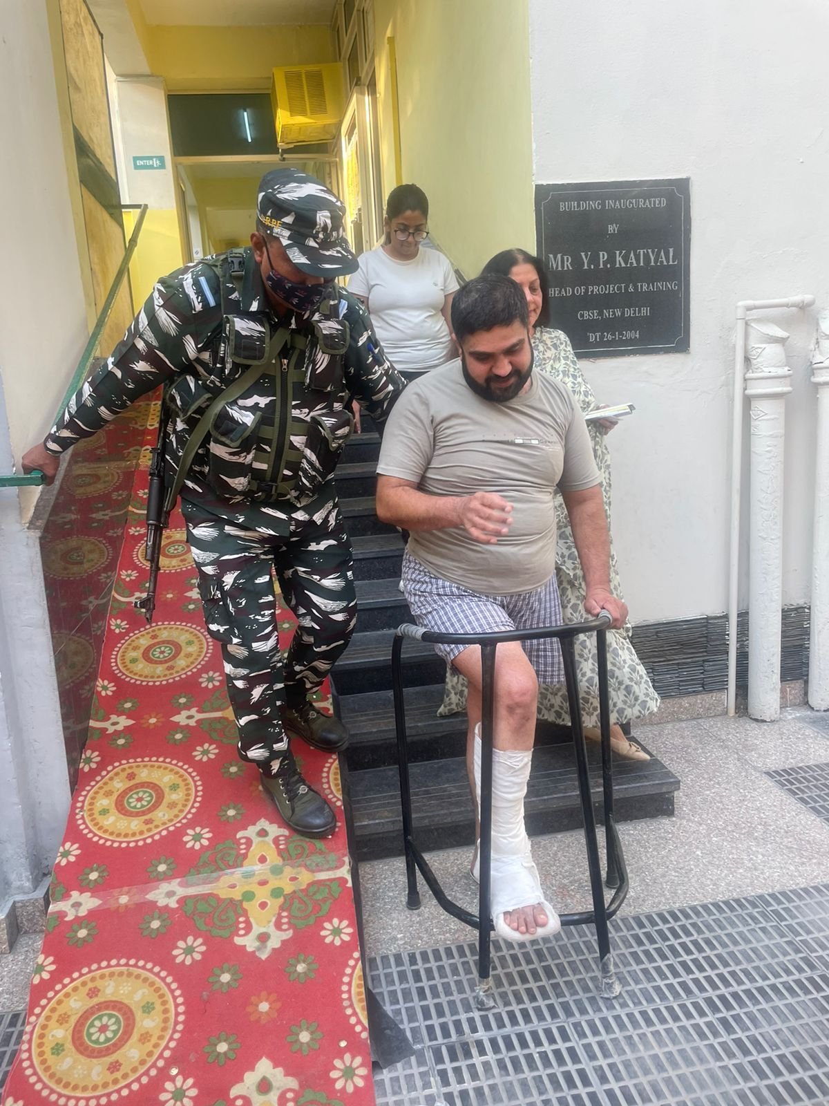 CRPF Jawan helping injured  voter to poll  votes