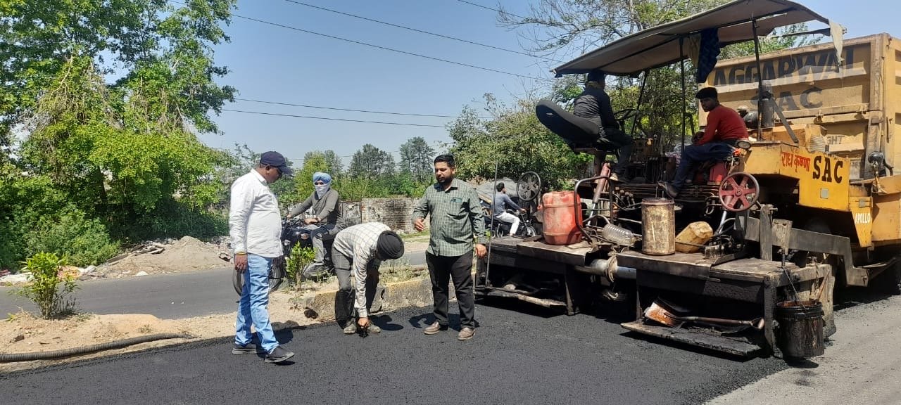 Carpeting on Nakodar road in progress 